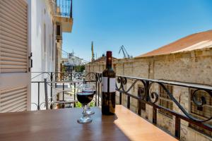 Ethrionplus two rooms apartments balconies 100 m from the port Syros Greece
