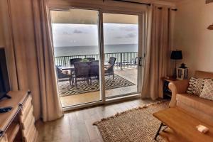 Barefoot Bliss - beachfront condo - sleeps 12