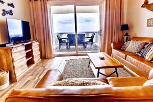 Barefoot Bliss - beachfront condo - sleeps 12