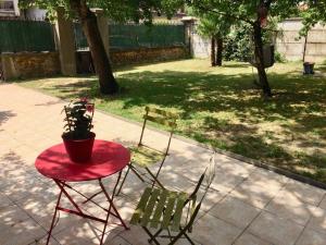 Appartements SUITE AVEC TERRASSE ET JARDIN AUX PORTES DE PARIS : photos des chambres