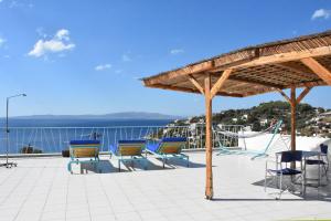 Vacation house with majestic blue sea and green mountain views Salamina Greece