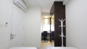 Clean and Cozy 2BR Apartment Parahyangan Residence By Travelio