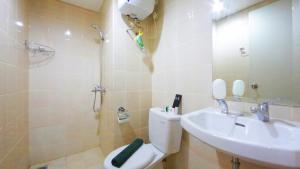 Clean and Cozy 2BR Apartment Parahyangan Residence By Travelio