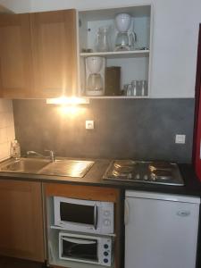 Appartements Le Cheval Blanc : photos des chambres