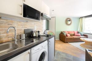 Appartements Suites Gaya Confort - Centre Ville : photos des chambres