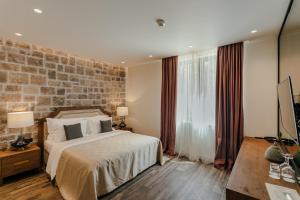 Deluxe Suite with Sea View room in Boutique Hotel Casa del Mare - Vizura