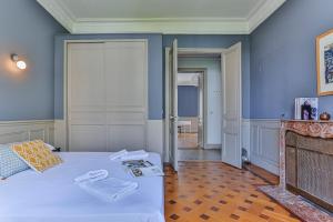 Appartements Maison Bianchi - 24 Paul Deroulede : photos des chambres