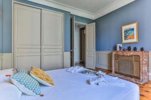 Appartements Maison Bianchi - 24 Paul Deroulede : photos des chambres