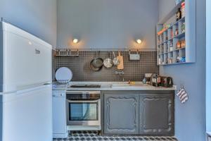 Appartements Maison Bianchi - 24 Paul Deroulede : photos des chambres