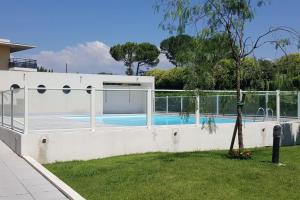 Appartements F1 de 36m2 avec terrasse et parking privatif. : photos des chambres