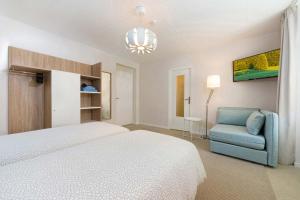 Appart'hotels Un Air de Famille : photos des chambres