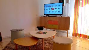 Maisons de vacances Gite urbain les jardins de la meyne : photos des chambres