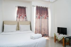 City View Studio Apartment at Signature Park Grande By Travelio