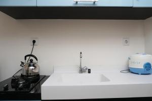 City View Studio Apartment at Signature Park Grande By Travelio