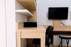 Comfy 2BR Apartment at M-Town Residence By Travelio