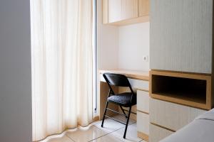 Comfy 2BR Apartment at M-Town Residence By Travelio