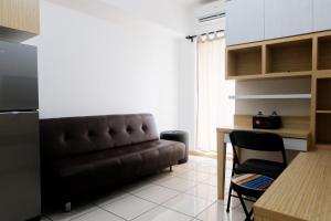 Comfy 2BR Apartment at M-Town Residence By Travelio