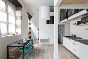 Appartements L'Instant by Cocoonr : photos des chambres