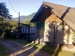 Casa e chalés da cachoeira