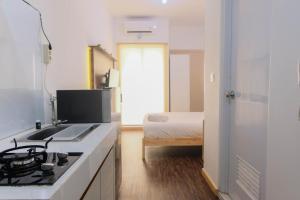 Cozy Studio Room at M-Town Apartment near Summarecon Serpong Mall By Travelio