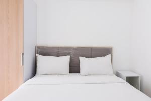 Comfy Studio at M-Town Gading Serpong Apartment By Travelio