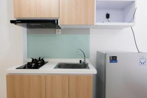 Comfy Studio at M-Town Gading Serpong Apartment By Travelio