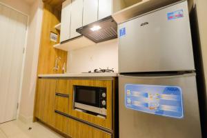 Best Furnished Studio Grand Kamala Lagoon Apartment By Travelio