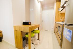 Best Furnished Studio Grand Kamala Lagoon Apartment By Travelio