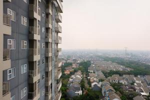 Minimalist Studio Room at Bintaro Icon Apartment By Travelio