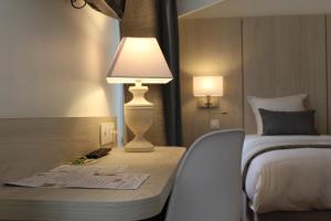 Hotels Logis Le Quai Fleuri : photos des chambres