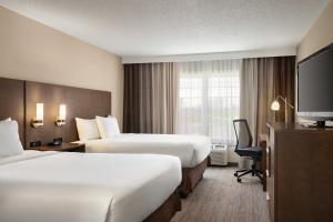 Queen Room with Two Queen Beds room in Country Inn & Suites by Radisson Buffalo MN