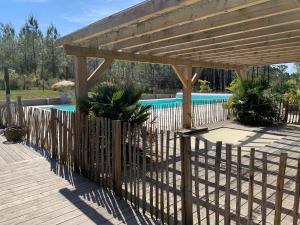Lodges Chalet 3 chambres en Bois dans les landes n37 : photos des chambres