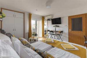 Studio apartman Comodo 