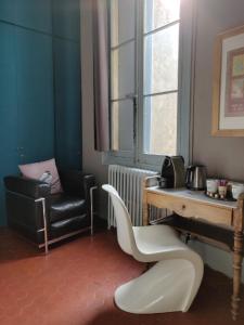 B&B / Chambres d'hotes En Ville et sous les Arbres : photos des chambres