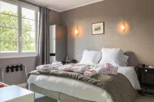 Maisons de vacances Maison 88 m2 le patio du centre ville avec garage : photos des chambres