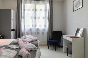 Maisons de vacances Maison 88 m2 le patio du centre ville avec garage : photos des chambres