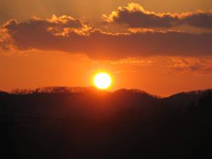 Sunset Ridge Cabin - A Romantic Smoky Mountain Escape or Family Getaway with Privacy - behind Dollywood, large game room, jacuzzi tub, fire pit, large wrap-around deck, and more