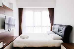 1BR Apartment at M-Town Residence near Summarecon Mall Serpong By Travelio