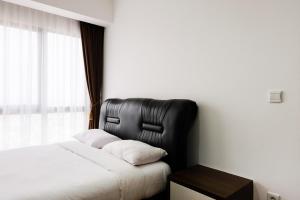 1BR Apartment at M-Town Residence near Summarecon Mall Serpong By Travelio