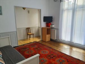 Appartements Suite Bacquenois 44 : photos des chambres