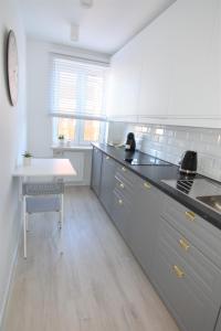 Apartament Plaza