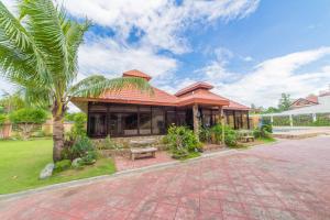 RedDoorz Plus @ Starhomes Olivianville