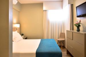 Premium One-Bedroom Apartment with Balcony and Pool View room in Aqualuz Lagos by The Editory