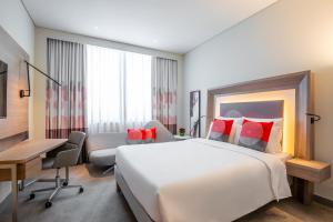 Superior Room with 1 Double Bed and 1 Sofa Bed room in Novotel Bur Dubai