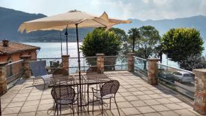 Panoramic Terrace steps from the Lake Iseo in Spacious Apartment