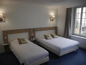 Hotels Logis Hotel du Commerce : photos des chambres