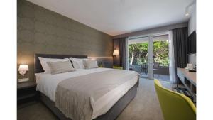 Deluxe Double Room with Balcony and Garden View room in Boutique Hotel Mirjam