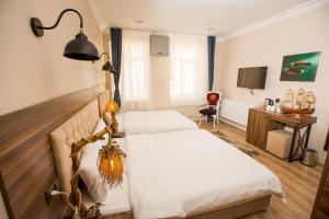 Quadruple Room room in Corner Garden Hotel
