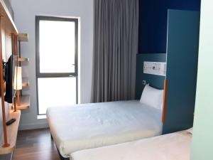 Hotels ibis budget Langres : photos des chambres