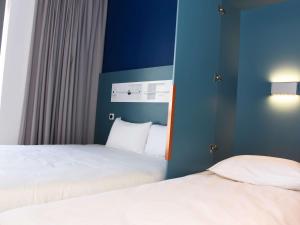 Hotels ibis budget Langres : photos des chambres